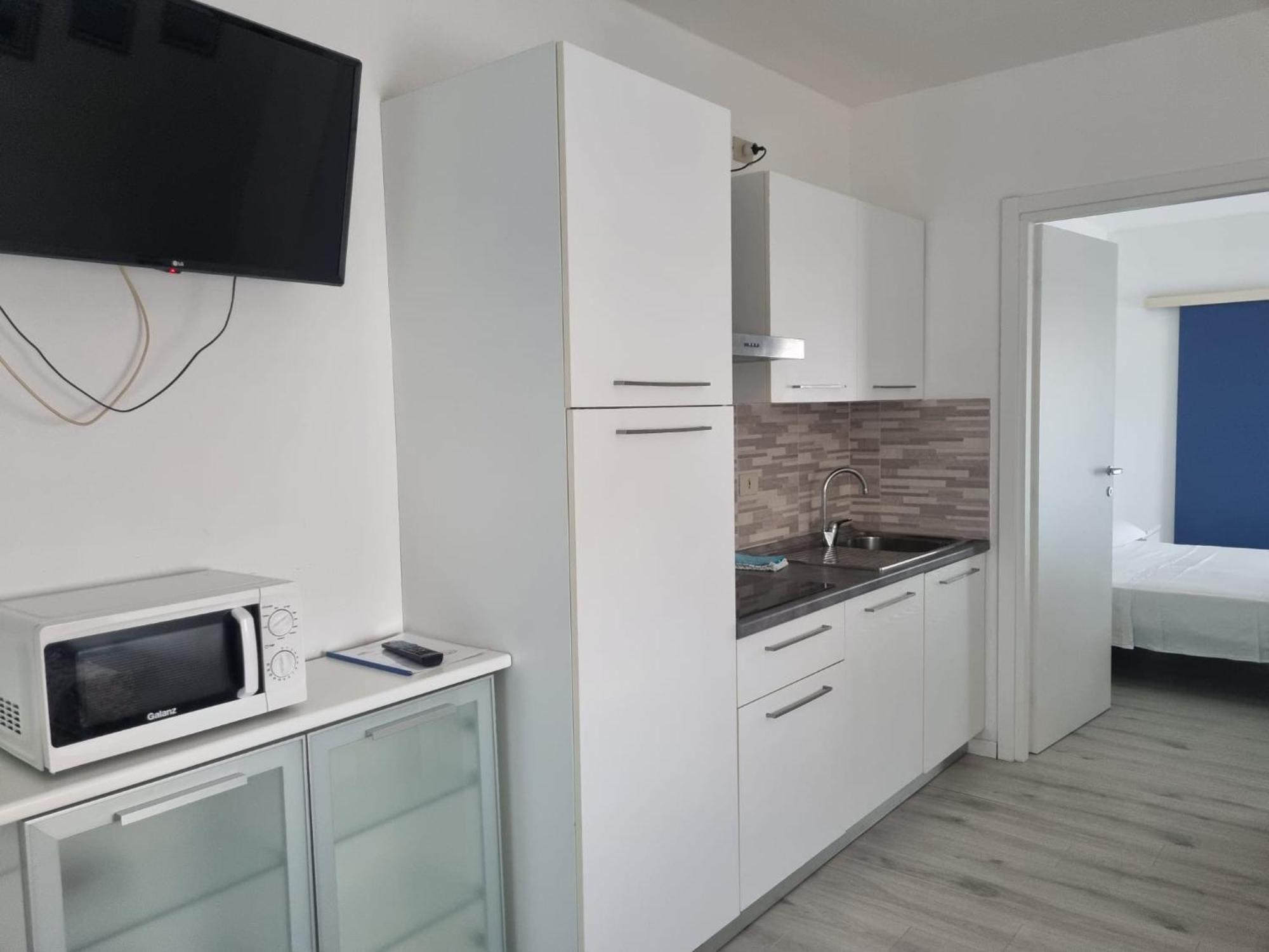Appart-Hotel Holiday Lignano Sabbiadoro Rom bilde